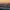 Panoramic, elevated view of the urban London skyline with soft, golden sunlight during sunrise, England
