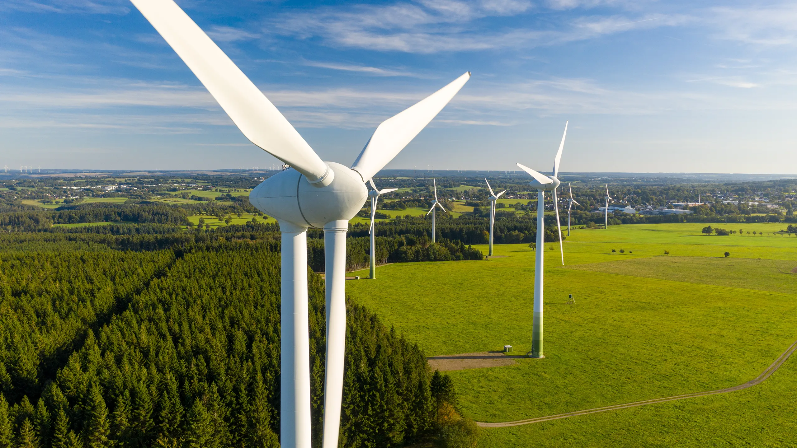 Wind turbines on a green field