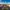 Skyline view of Buenos Aires with lots of cars on the road and tall monument in the middle 