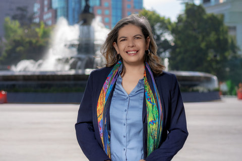 Portrait of Jacquelina Dankfort, Country Manager, Mexico and Business Generation Lead, Latin America, outside in front of a water sculpture