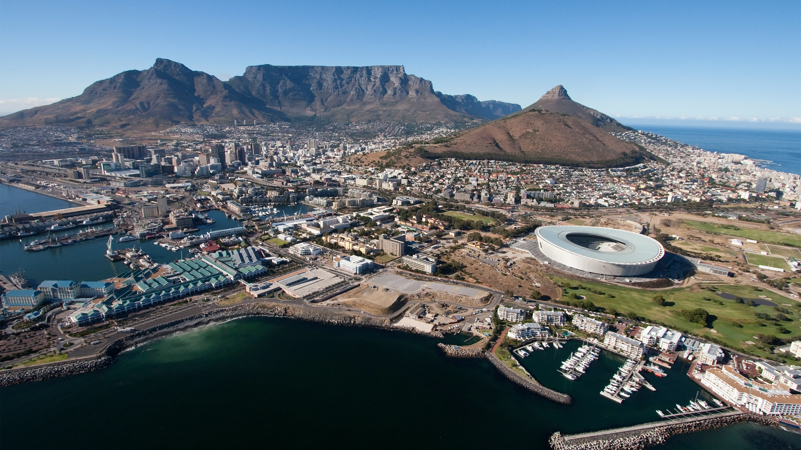 Aerial view of sports stadium by the coast